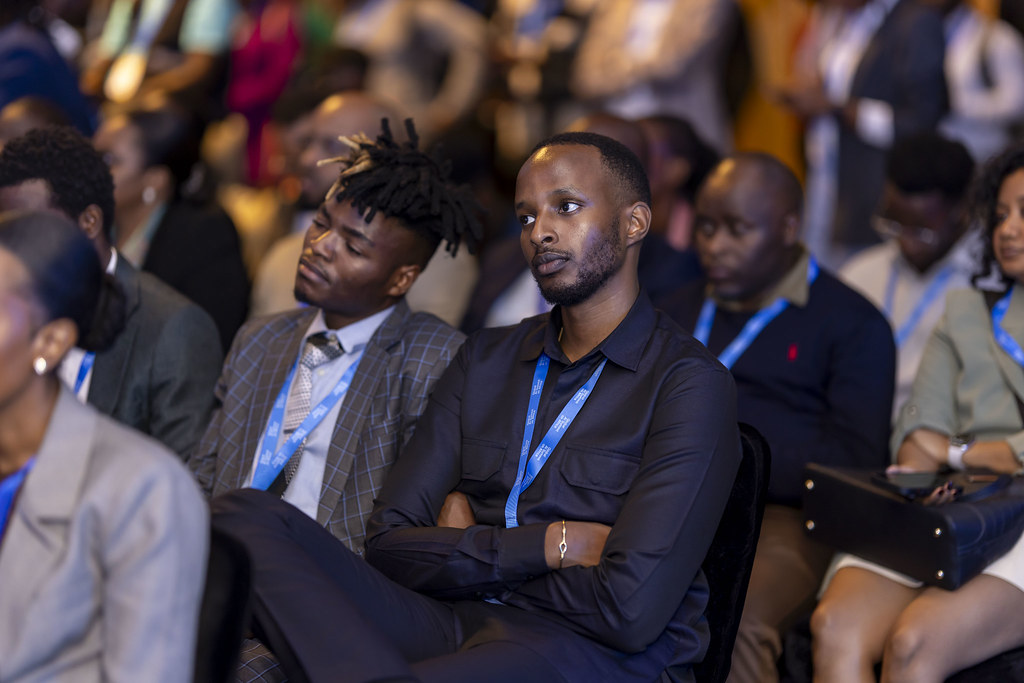 Young professionals at a Global AI Summit session
